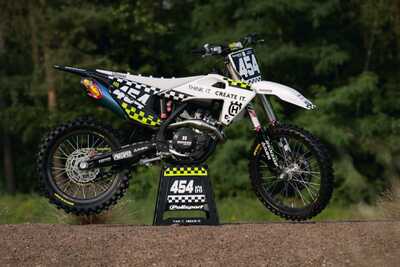 Custom dirt bike graphics with a personal style, black and white checker design with toxic yellow accents, Pulp MX Logo