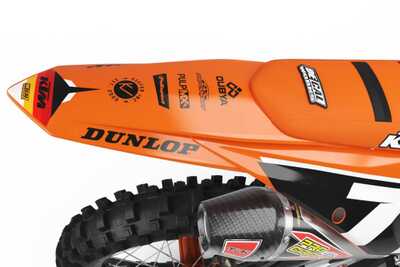 DeCal Works Think It. Create It. Series KTM dirt bike graphics in orange and black with Officially Licensed Dunlop Logos